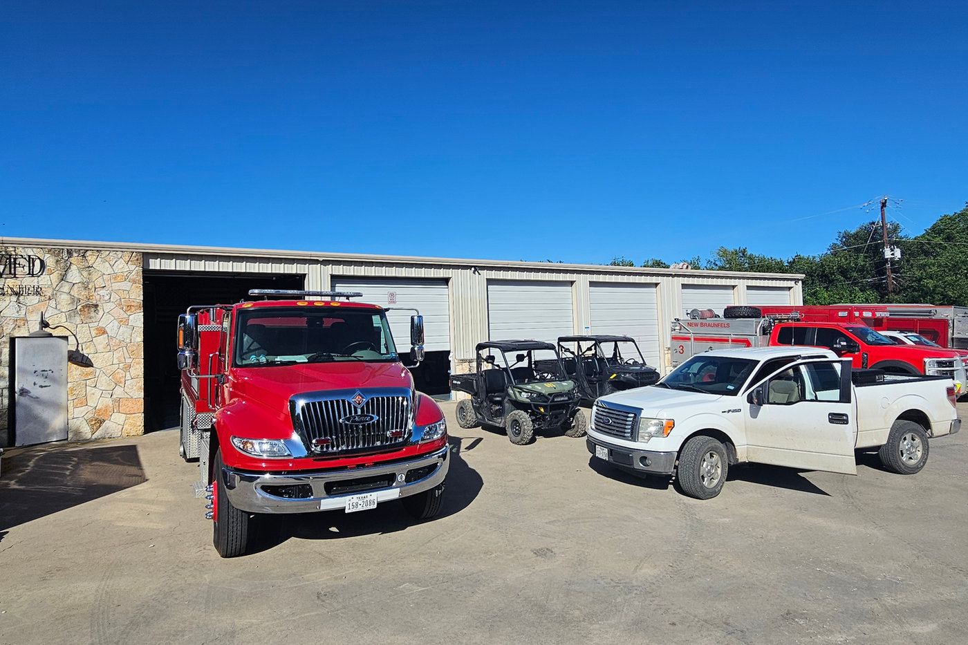 Fire and rescue vehicles staged at a station